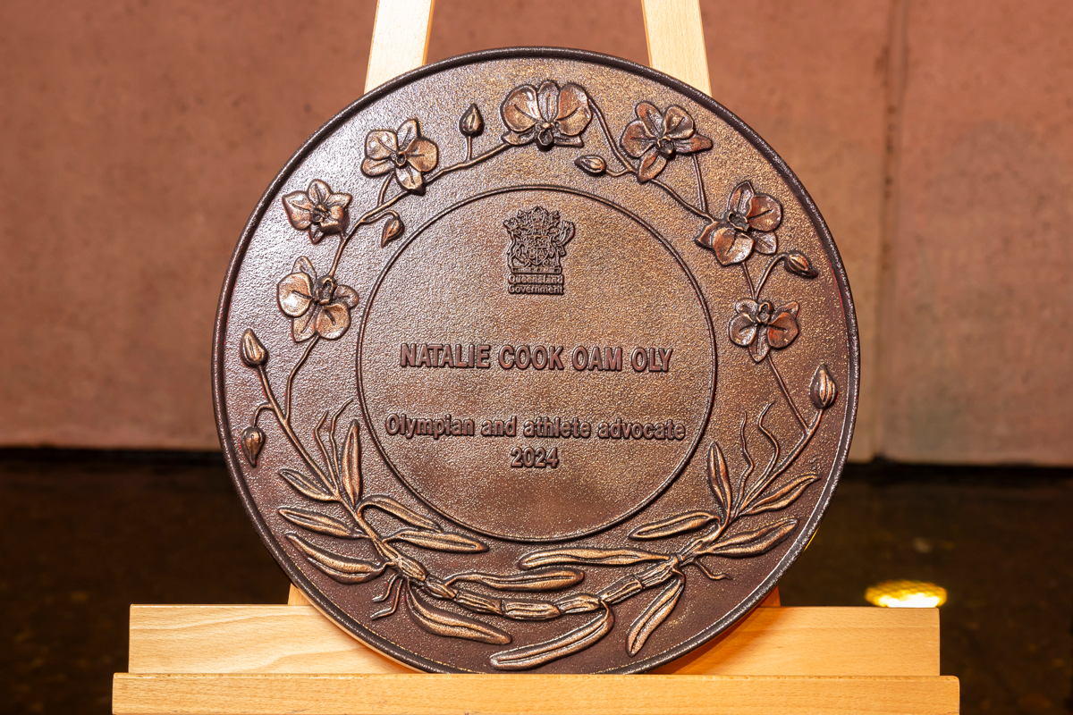 Natalie Cook OAM OLY Olympian and athlete advocate 2024 Queensland Greats Award plaque