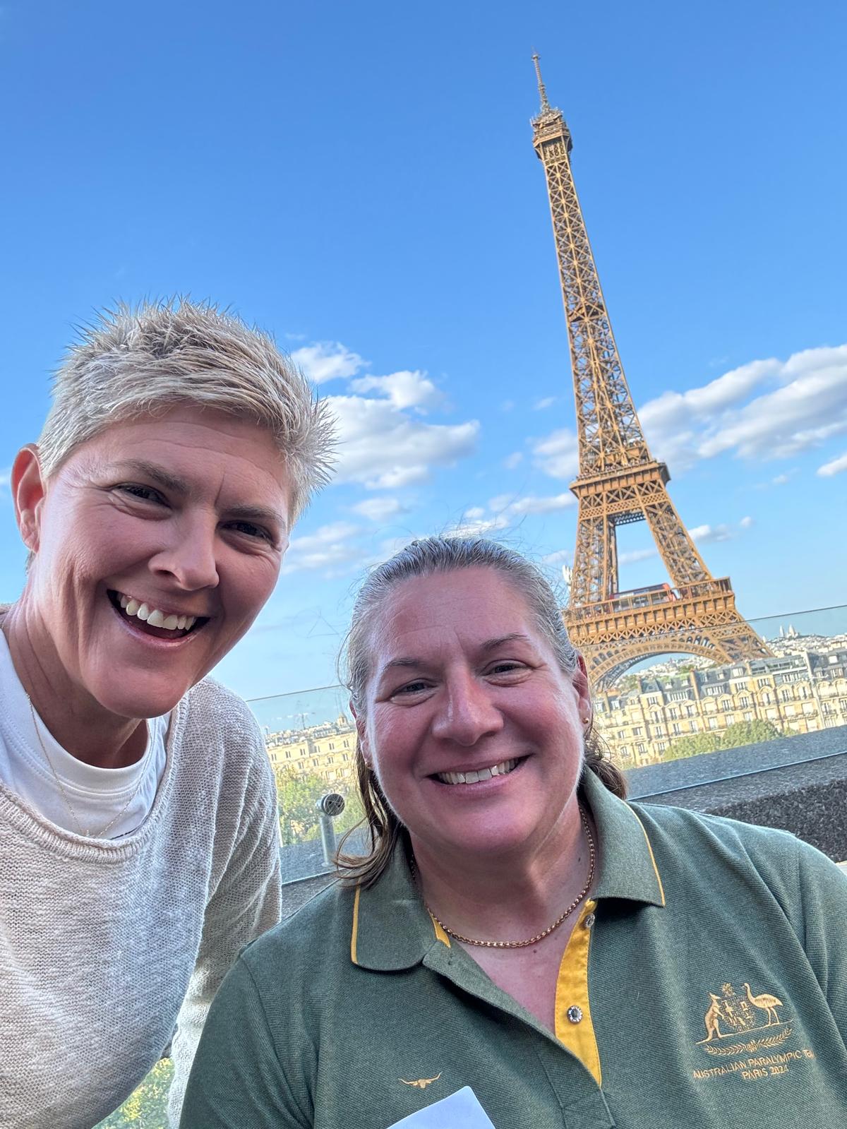 Nat Cook OAM OLY with Australian Paralympians Louise Sauvage, posing in front of the Eiffel Tower at the Paris 2024 Paralympics welcome event