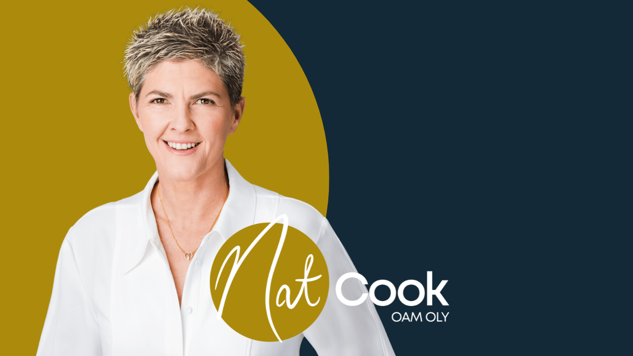 Nat Cook OAM OLY smiling and wearing a white collared shirt, on a navy and gold background with the new Nat Cook gold volleyball logo